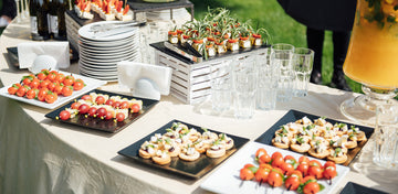 People enjoying a variety of dishes at an event